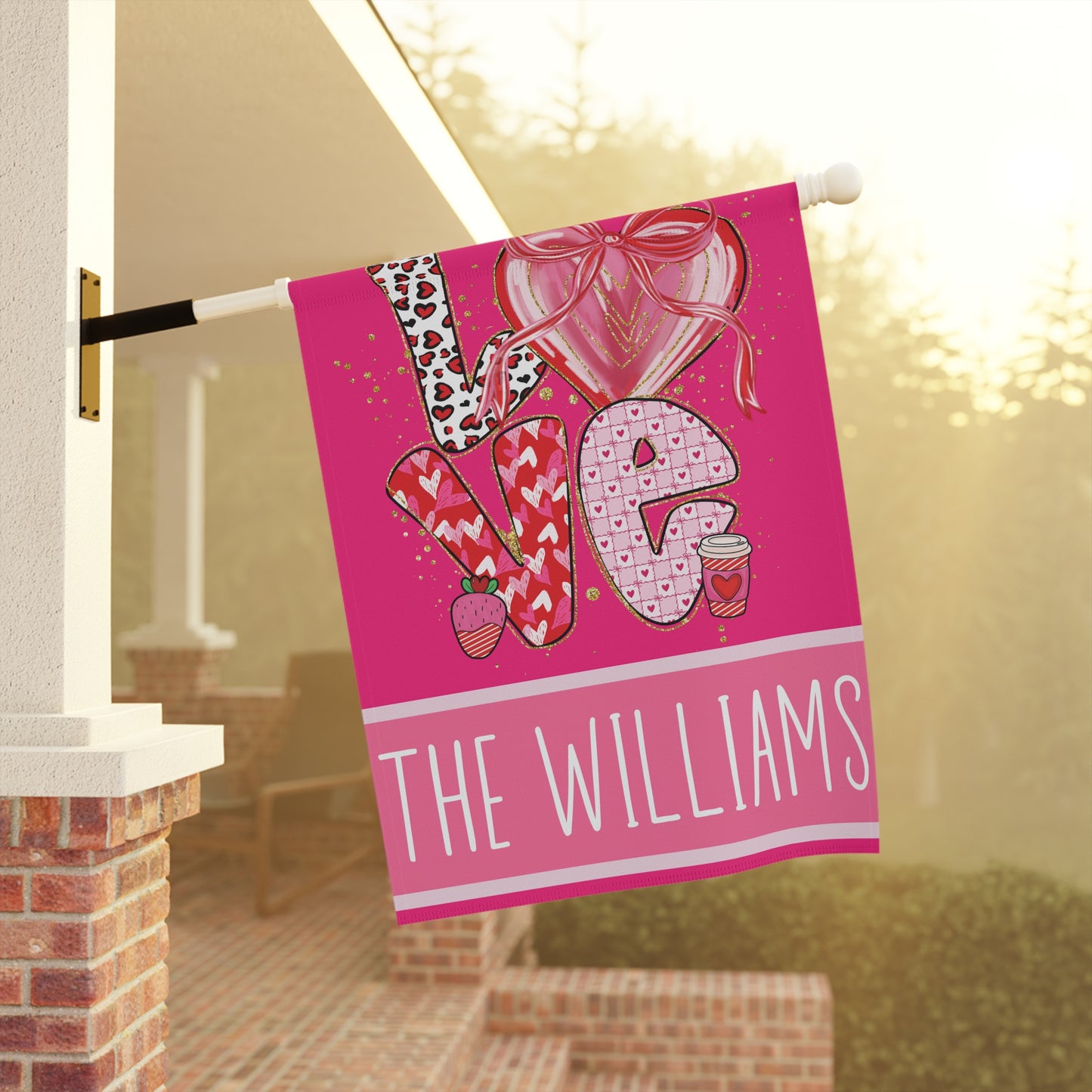 bright pink LOVE Valentines garden flag with hearts, strawberry and coffee cup details and personalized family name bar at bottom