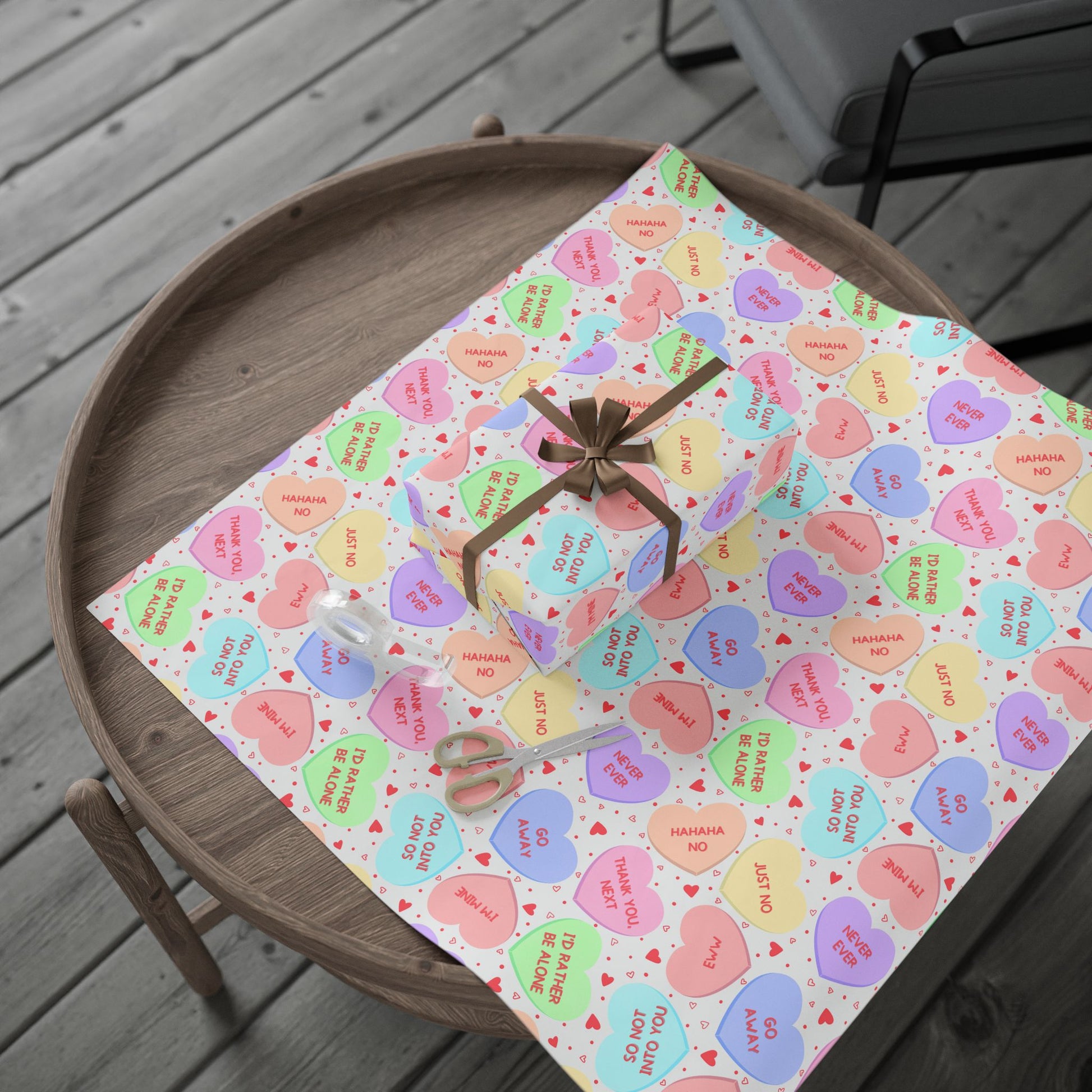 Wrapping paper — Galentines conversation-heart print with pastel candy hearts, one-sided 90gsm fine art paper, glossy or matte finish.
