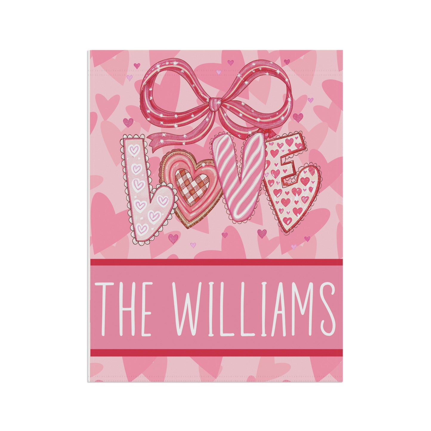 Valentines day garden flag on metal stand in snowy winter garden, pink LOVE design with hearts and personalized family name