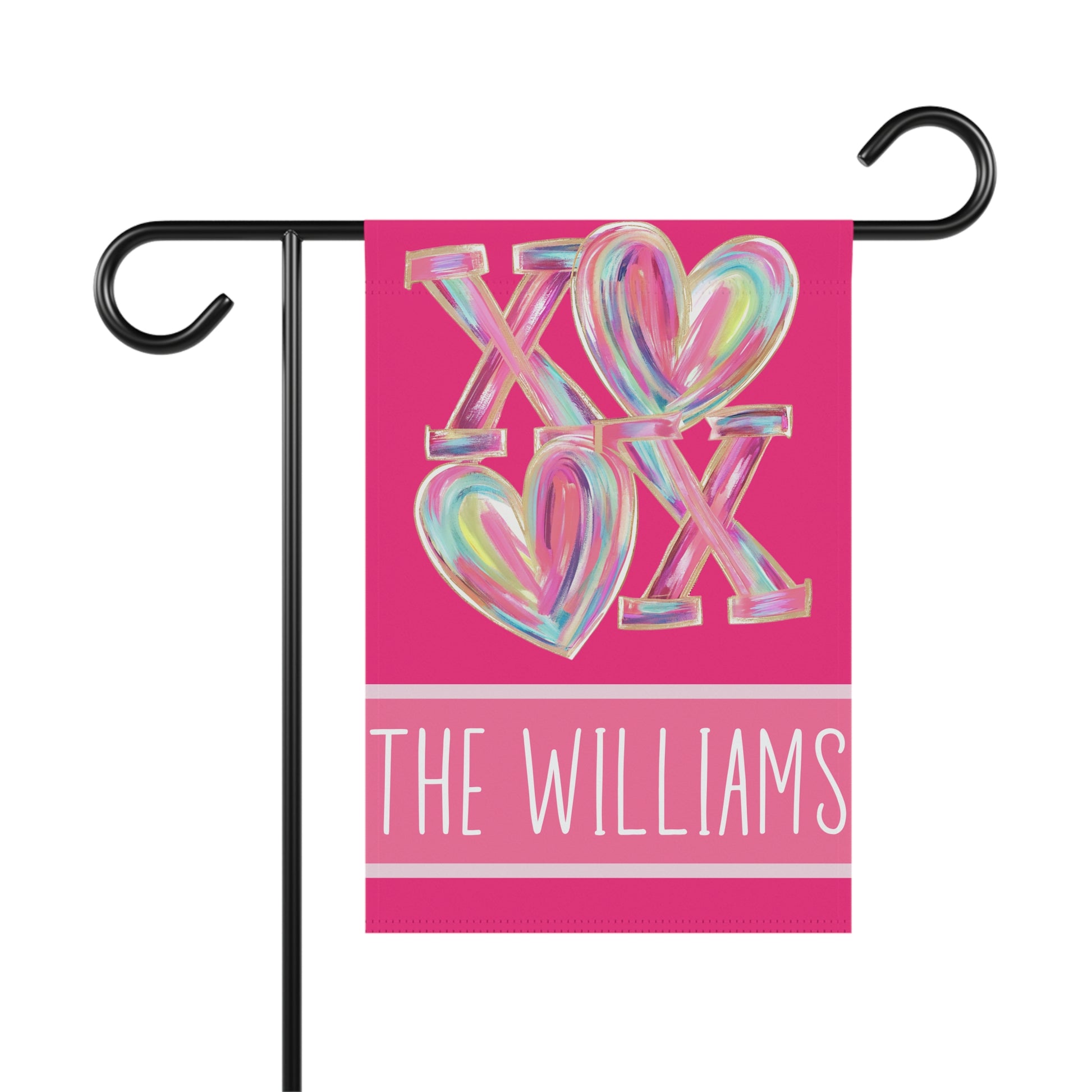 personalized XOXO Valentines garden flag with colorful heart design and family name on hot pink background in front yard