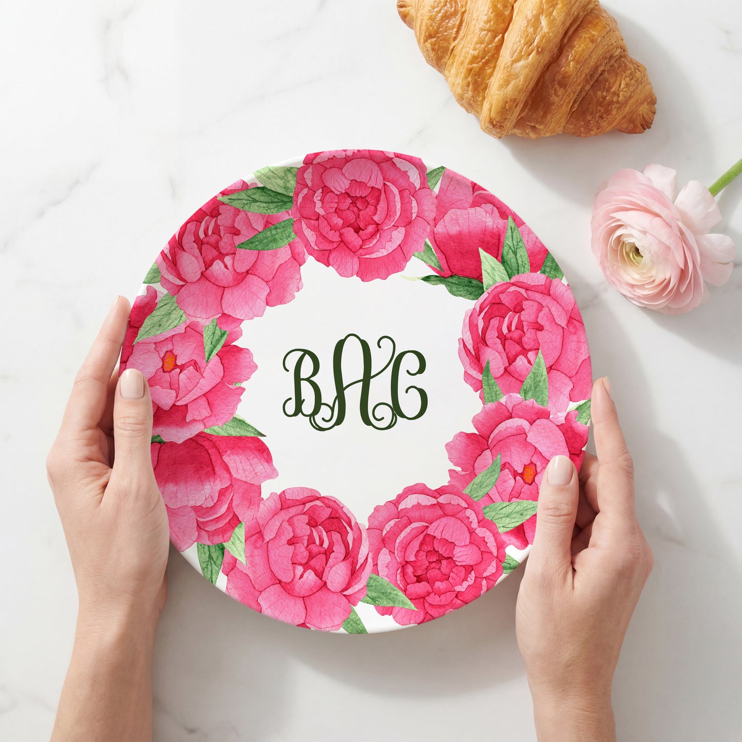 Personalized melamine plate featuring a vibrant wreath of watercolor pink peonies surrounding a custom three-letter monogram, creating an elegant floral plate perfect for weddings, housewarmings, Mother's Day gifts, and personalized table décor.