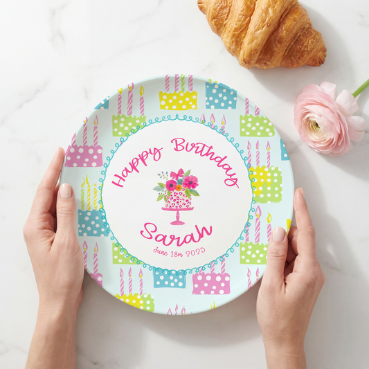 Personalized melamine birthday plate featuring a colorful pastel birthday cake pattern, custom name, and optional birth date, designed as a reusable keepsake for annual birthday celebrations.