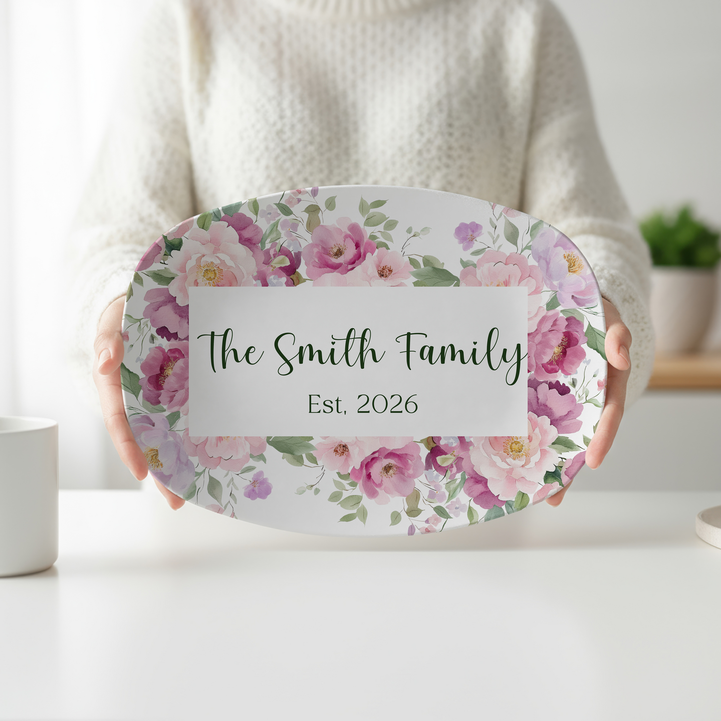 Personalized oval serving platter featuring watercolor purple, blush pink, and lavender flowers surrounding a custom family name and established year. Elegant floral serving tray perfect for weddings, housewarming gifts, entertaining, and personalized kitchen décor.