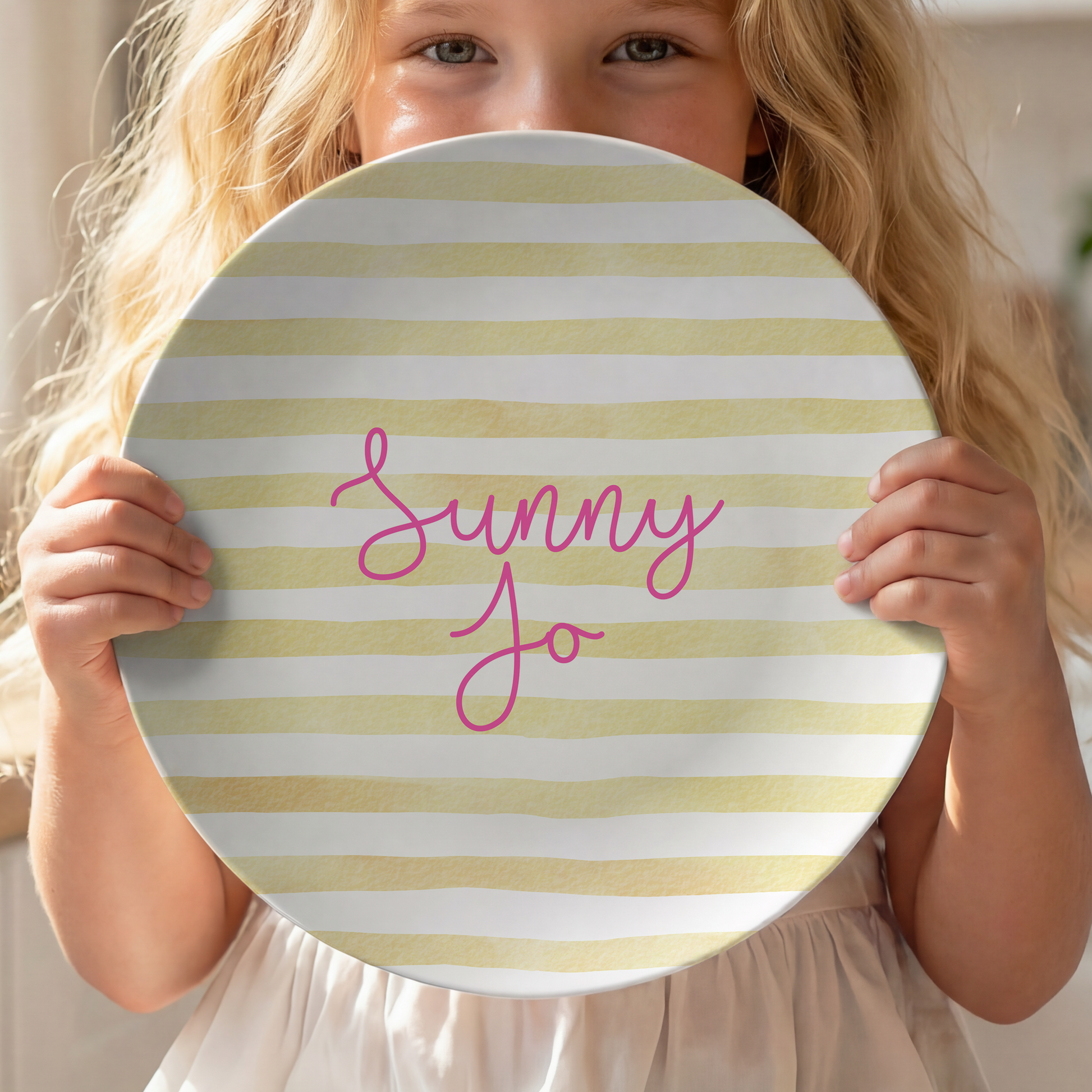 Personalized 10-inch round kids plate featuring soft watercolor yellow stripes and a custom name in bright pink script. Durable, lightweight children's dinner plate perfect for everyday meals, birthdays, baby showers, Easter baskets, and personalized gifts.